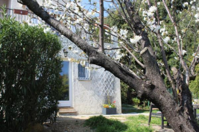 Rez de villa avec beau jardin et belle vue